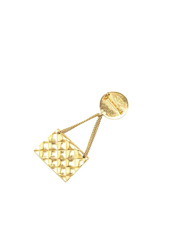 This brooch features a metal body and a back pin closure.Brand: Chanel VintageCondition: PrelovedType: Costume BroochRating: B+Main Material: MetalDimensions (LxWxD): 7.6x3.3x0Comments: Exterior Back Scratched. Lock Scratched. Exterior Front Scratched.