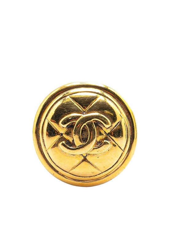 This brooch features a gold-tone metal body and a back pin closure.Brand: Chanel VintageCondition: PrelovedType: Costume BroochRating: B+Main Material: MetalDimensions (LxWxD): 3x3x0Comments: Exterior Back Scratched. Lock Scratched. Exterior Front Scratched.