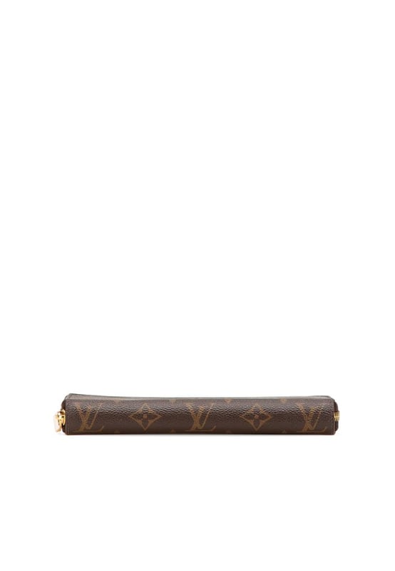 This wallet features a monogram canvas body a zip-around closure and interior zip and slip pockets.Brand: Louis Vuitton VintageCondition: PrelovedType: Long WalletsRating: B+Main Material: CanvasDimensions (LxWxD): 10x19x2.5Comments: Exterior Bottom Worn. Exterior Corners Worn. Interior Pocket stained with Other. Interior Lining Worn. Exterior Side Worn. Exterior Top Worn. Zipper Rusty/Tarnished Scratched.