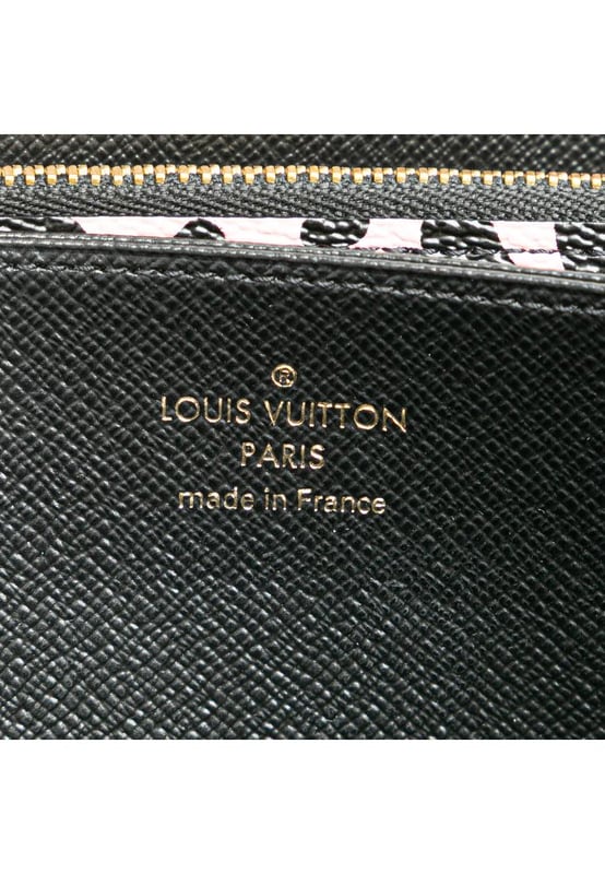 This long wallet features a monogram canvas body a zip around closure and interior zip and slip compartments.Brand: Louis Vuitton VintageCondition: PrelovedType: Long WalletsRating: ABMain Material: CanvasDimensions (LxWxD): 10.5x19.5x2.5Comments: Exterior Corners Worn. Interior Pocket stained with Other. Interior Lining Worn. Interior Lining stained with Other. Exterior Side Worn. Exterior Top Worn. Zipper Rusty/Tarnished Scratched.