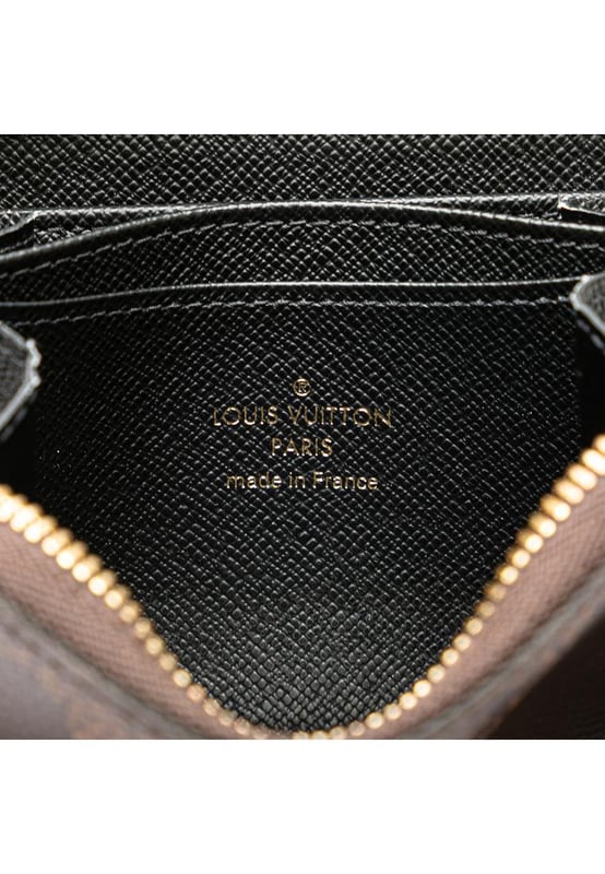 This coin purse features a monogram giant canvas body a zip-around closure and interior slip compartments.Brand: Louis Vuitton VintageCondition: PrelovedType: Coin PouchRating: ABMain Material: CanvasDimensions (LxWxD): 8.5x11x2Dust Bag: YesComments: Exterior Corners Worn. Interior Lining Worn. Interior Lining stained with Other. Exterior Top Worn. Zipper Scratched.