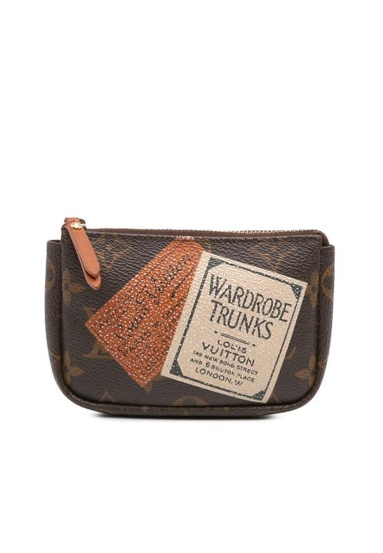 The Pochette Cles features a printed monogram canvas body and a top zip closure.Brand: Louis Vuitton VintageCondition: PrelovedType: Coin PouchRating: B+Main Material: CanvasDimensions (LxWxD): 9.5x15x3Handle Drop: 13Comments: Interior Lining Loose Stitching. Practical Attachment Scratched. Exterior Top Loose Stitching. Zipper Rusty/Tarnished.