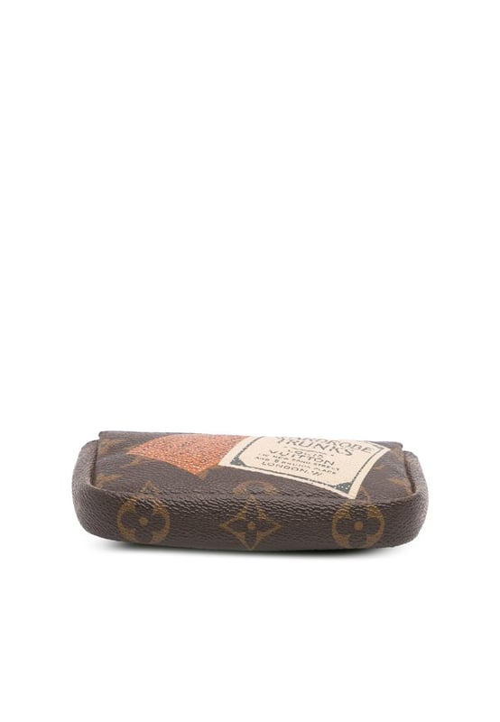 The Pochette Cles features a printed monogram canvas body and a top zip closure.Brand: Louis Vuitton VintageCondition: PrelovedType: Coin PouchRating: B+Main Material: CanvasDimensions (LxWxD): 9.5x15x3Handle Drop: 13Comments: Interior Lining Loose Stitching. Practical Attachment Scratched. Exterior Top Loose Stitching. Zipper Rusty/Tarnished.