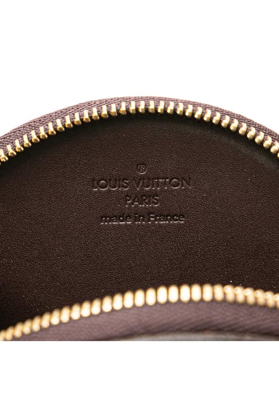 This coin pouch features a monogram vernis leather body a key chain attachment and a zip around closure.Brand: Louis Vuitton VintageCondition: PrelovedType: Coin PouchRating: B+Main Material: LeatherDimensions (LxWxD): 10x10.5x1.5Dust Bag: YesComments: Exterior Back Scratched. Exterior Back stained with Other. Exterior Bottom stained with Other. Embellishment Scratched. Exterior Front stained with Other. Interior Lining Scratched. Interior Lining stained with Other. Zipper Rusty/Tarnished Scratched.