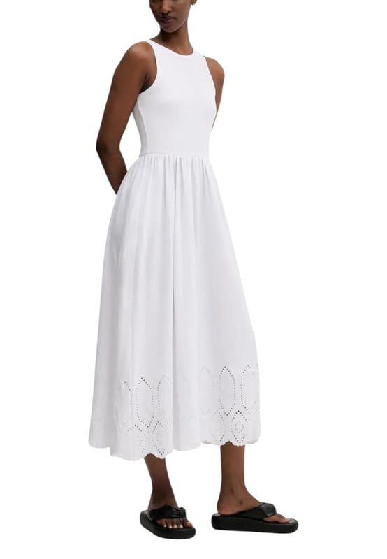 Brand: Desigual
  Gender: Women
  Type: Dresses
  Season: Spring/Summer
  Color: white
  Sleeves: straps
  Neckline: round neck
  Article code: 25SWVK58
  Composition: 99% cotton 1% elastane
  Washing: machine wash at 30Â°
Material: Cotton