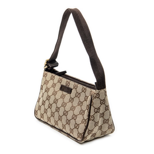 Gucci Accessoires Mini Zip Pouch  Buidel in de Beige/Bruin Doek in de Goud  hardware. Het product is in In Uitstekende Staat (A).
  Afmetingen: 19x12x9 cm 
  Inclusief accessoires: None
  Opmerkingen over de hardware: Lichte verkleuring
  BrandCo Paris vindt zeldzame artikelen in de beste staat voor ongelooflijke prijzen. Het is de moeite waard om geduldig te zijn! Koop met vertrouwen: alle artikelen van BrandCo Paris worden zorgvuldig geselecteerd en geverifieerd door ons team van experts.

  Alle artikelen worden geleverd met een certificaat van echtheid en verpakt door BrandCo Paris.

  Classificatietabel voor de conditie van het artikel:

  N (als nieuw)
  AA (perfecte staat)
  A (uitstekende staat)
  AB (zeer goede staat)
  B (goede/redelijke staat)