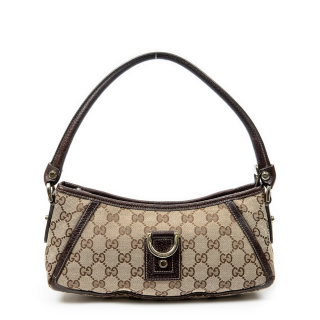 Gucci Bolsos Abbey D-Ring Pochette  Bolso de hombro en Beige/Marrón Lienzo y Oro hardware. El producto esta en Excelentes Condiciones (A).
  Dimensiones: 27x13x8 cm 
  Accesorios incluidos: None
  
  BrandCo Paris encuentra artículos raros y en las mejores condiciones a precios increíbles. ¡Vale la pena tener paciencia! Compra con confianza: todos los artículos de BrandCo Paris son seleccionados y autenticados cuidadosamente por nuestro equipo de expertos.
  Todos los artículos vienen con un certificado de autenticidad y un embalaje entregado por BrandCo Paris.
  Tabla de clasificación de la condición del artículo
  N (como nuevo)
  AA (perfecto estado)
  A (excelente estado)
  AB (muy buen estado)
  B (bueno/regular)
