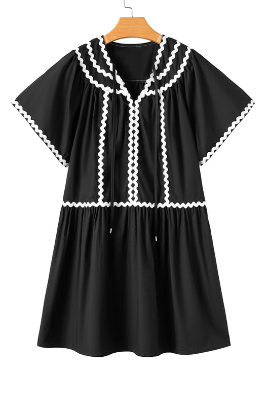 Our styles are designed with a trendy fitted look in mind following an international size standard. For the best fit we suggest choosing one size up from your usual. Be sure to check our sizing chart to find your perfect match!
  Vibrant contrast ricrac trim adds a playful touch
  Flattering V
  neck and short sleeves for a chic look
  Loose fit provides comfort and easy movement
  Mini length showcases a flirty and stylish silhouette
Material: 100% Cotton