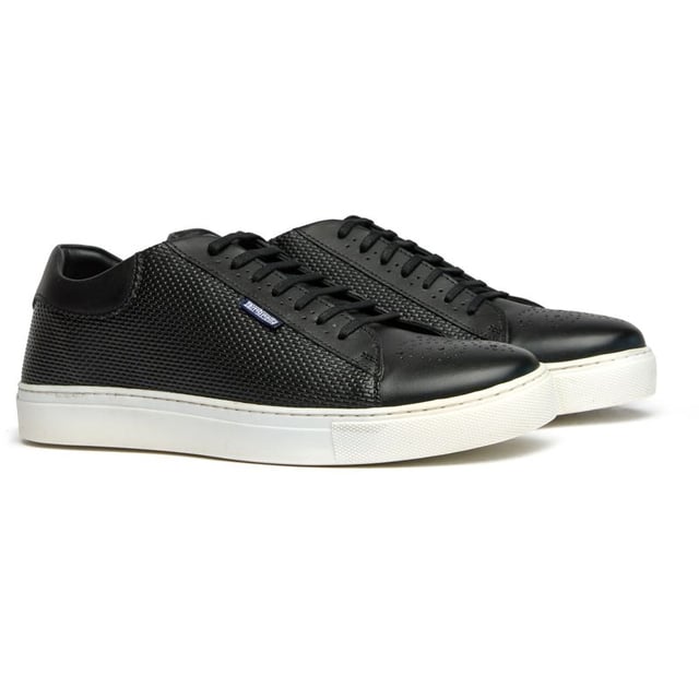 Mens black Lambretta peter trainers, manufactured with leather and a rubber sole. Featuring: contoured insole, leather upper, brogue toe design and lambretta branding.
