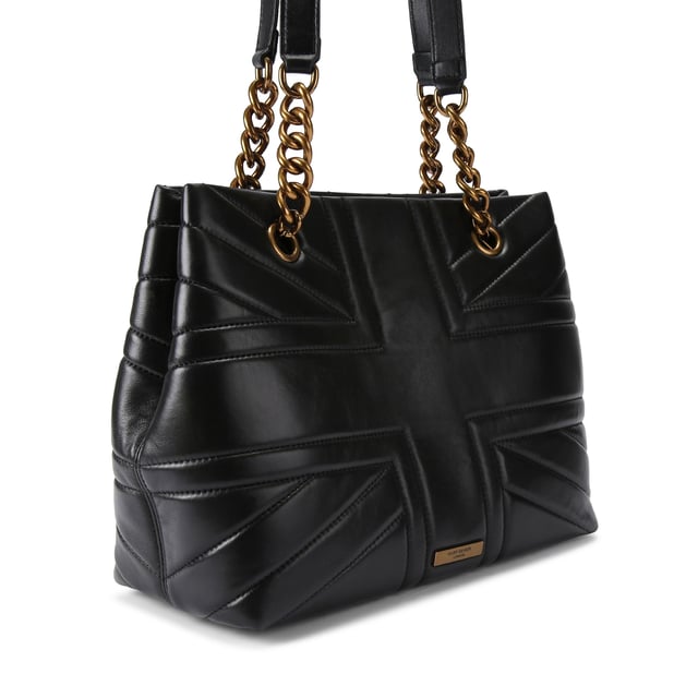 This Kurt Geiger Kensington Union Jack tote bag  is crafted from a black leather with overstitch quilting creating a Union Jack. There is an antiqued brass eagle on the front of the bag. Dimensions: 26cm (H), 35cm (L), 14cm (D). Strap length: 68cm.