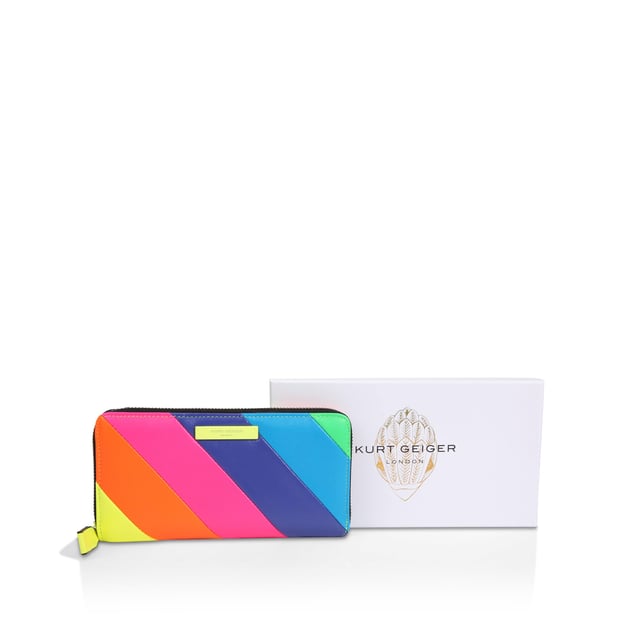 The Brixton Zip Around Wallet is crafted from a neon leather creating the iconic stripe pattern. The neon yellow metal branded plate sits on the front of the wallet. 10cm (H), 19.5cm (L), 2cm (D).
