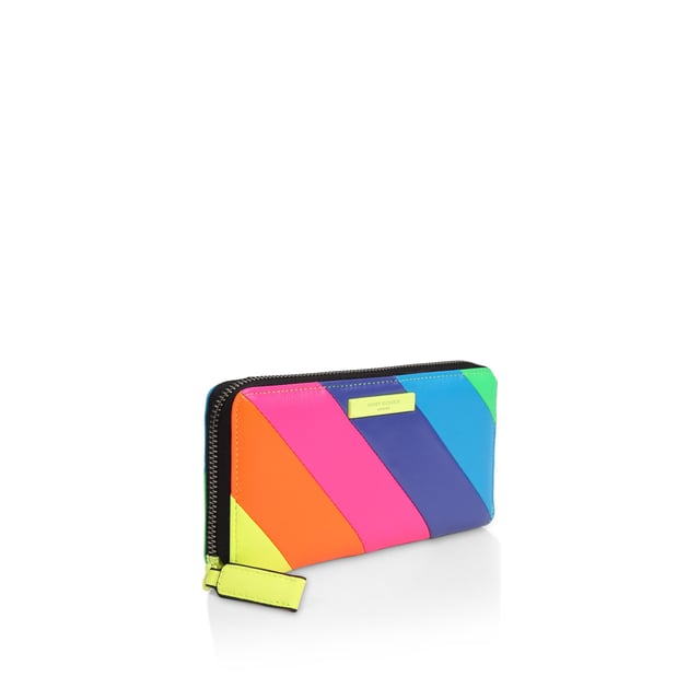 The Brixton Zip Around Wallet is crafted from a neon leather creating the iconic stripe pattern. The neon yellow metal branded plate sits on the front of the wallet. 10cm (H), 19.5cm (L), 2cm (D).