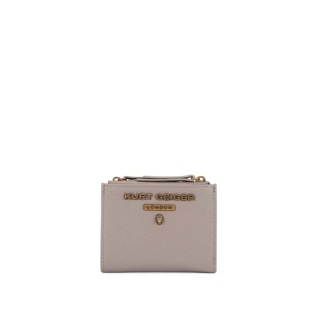 The Greenwich Mini Purse features a taupe grained leather exterior. There is an antiqued brass eagle head and branding on the front. 9cm (H), 11cm (L), 2cm (D).