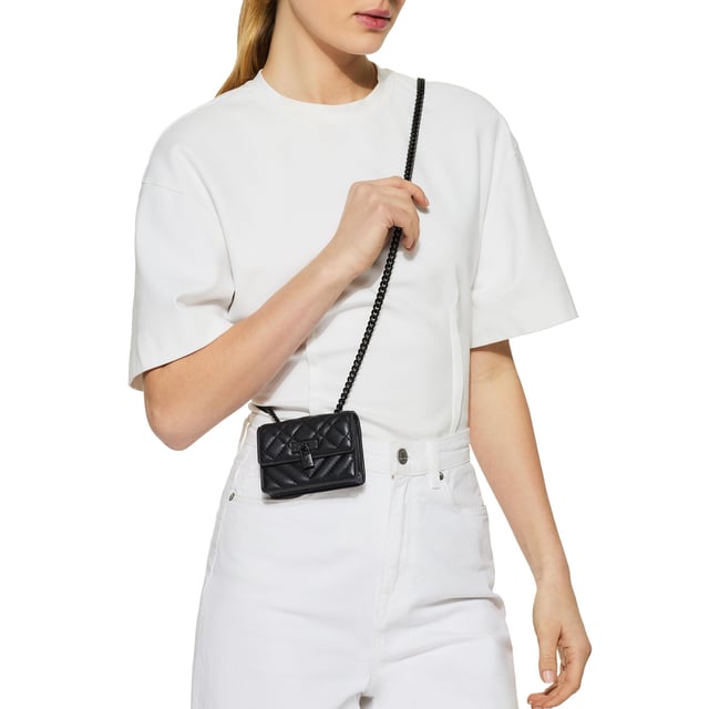 This Kurt Geiger Micro Drench Brixton bag features a black leather alternative exterior with overstitch quilting on the exterior. There is an antiqued brass branded lock on the front flap. Dimensions: 7.5cm (H), 11cm (L), 3cm (D). Strap length: 121cm.