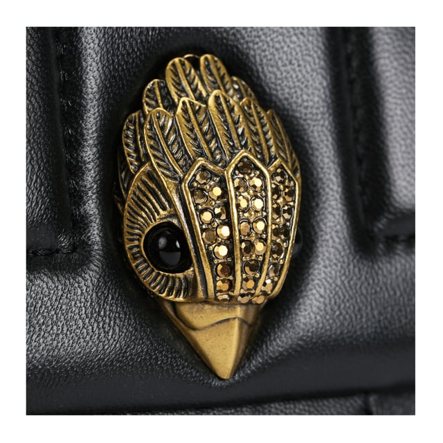 The Kurt Geiger Kensington Union Jack bag is crafted from a soft lambskin leather with stitched Union Jack design. The antiqued brass eagle head features crystals on the front flap. 14cm (H), 20cm (L), 6cm (D) Strap drop cross body: 120cm Strap drop shoulder: 70cm