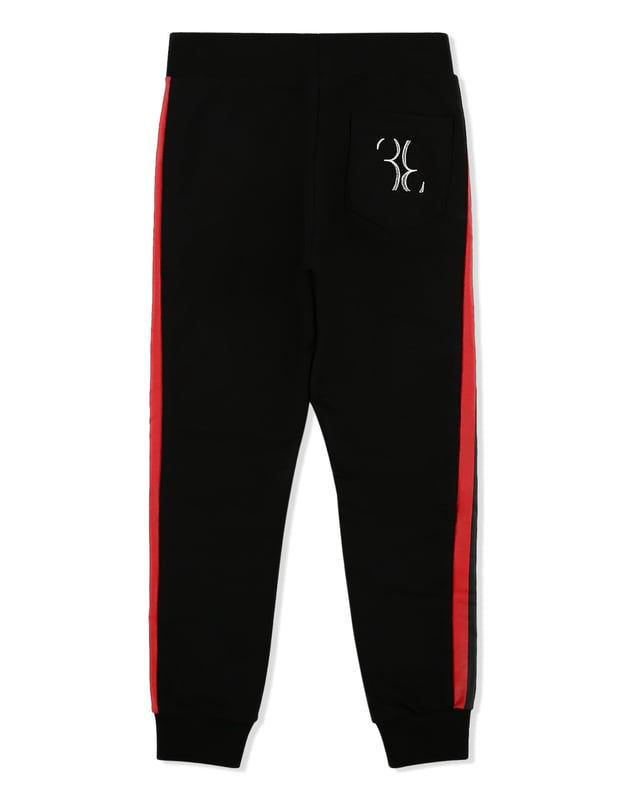 The brand's monogram is the defining feature of these cotton fleece sweatpants. It is embroidered on the right rear pocket. Contrasting sidebands are printed on both legs. Two slit pockets on the front and one on the back. Ribbed waistband and bottom cuffs.