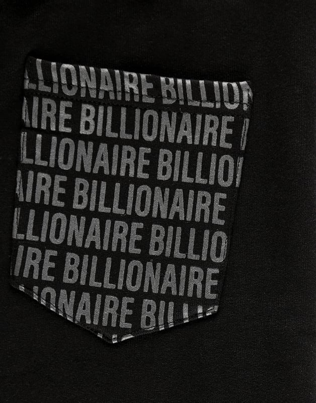 The brand's lettering is the defining feature of these cotton fleece sweatpants. It is printed all-over the right rear pocket. Two slit pockets on the front and one on the back. Ribbed waistband and bottom cuffs.