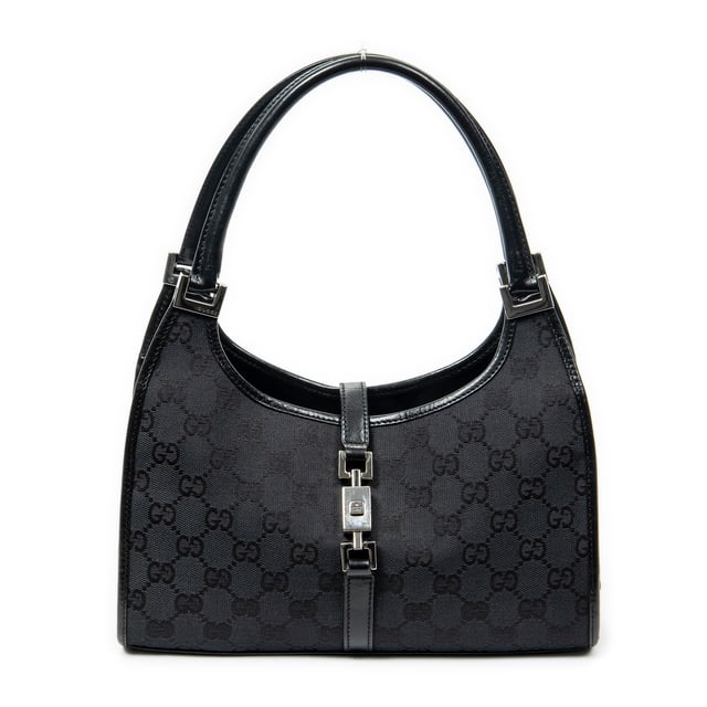 Gucci Tassen Small Bardot Tote  Schoudertas in de Zwart Doek in de Zilver  hardware. Het product is in In Uitstekende Staat (A).
  Afmetingen: 26x20x8 cm 
  Inclusief accessoires: None
  
  BrandCo Paris vindt zeldzame artikelen in de beste staat voor ongelooflijke prijzen. Het is de moeite waard om geduldig te zijn! Koop met vertrouwen: alle artikelen van BrandCo Paris worden zorgvuldig geselecteerd en geverifieerd door ons team van experts.

  Alle artikelen worden geleverd met een certificaat van echtheid en verpakt door BrandCo Paris.

  Classificatietabel voor de conditie van het artikel:

  N (als nieuw)
  AA (perfecte staat)
  A (uitstekende staat)
  AB (zeer goede staat)
  B (goede/redelijke staat)