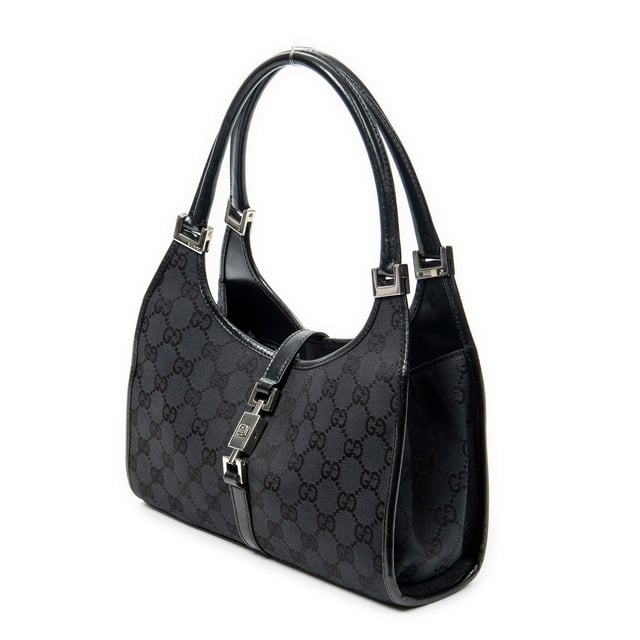 Gucci Tassen Small Bardot Tote  Schoudertas in de Zwart Doek in de Zilver  hardware. Het product is in In Uitstekende Staat (A).
  Afmetingen: 26x20x8 cm 
  Inclusief accessoires: None
  
  BrandCo Paris vindt zeldzame artikelen in de beste staat voor ongelooflijke prijzen. Het is de moeite waard om geduldig te zijn! Koop met vertrouwen: alle artikelen van BrandCo Paris worden zorgvuldig geselecteerd en geverifieerd door ons team van experts.

  Alle artikelen worden geleverd met een certificaat van echtheid en verpakt door BrandCo Paris.

  Classificatietabel voor de conditie van het artikel:

  N (als nieuw)
  AA (perfecte staat)
  A (uitstekende staat)
  AB (zeer goede staat)
  B (goede/redelijke staat)