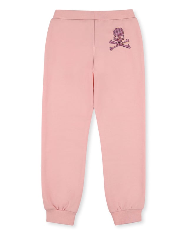 These most classic cotton fleece jogging pants get a decisive Plein twist thanks to the rhinestone skull printed on the back. Two slit pockets. Ribbed waistband and bottom cuffs.