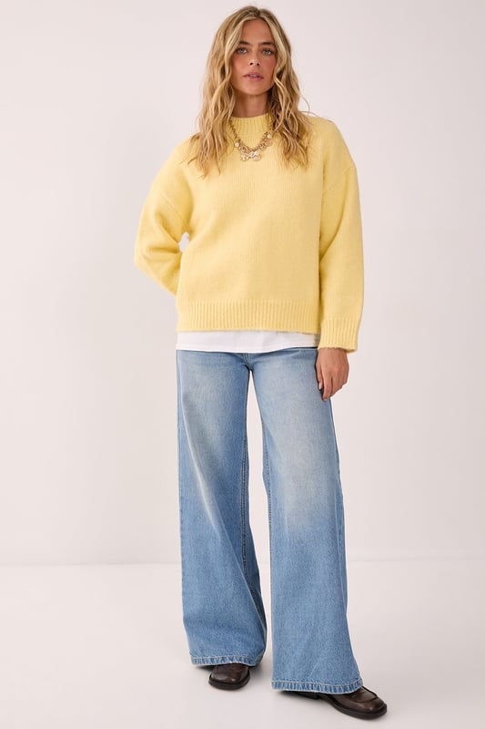 Cosy turtleneck design for ultimate comfort
        Oversized fit with voluminous balloon sleeves
        Ribbed cuffs and hem for a snug finish
        Soft knitted texture for a luxurious feel
        Versatile piece suitable for various casual occasions
    
    Embrace the chilly season with this NastyGal turtleneck sweater, a must-have addition to your autumn-winter wardrobe. The oversized silhouette paired with dramatic balloon sleeves creates a striking visual impact, perfect for those who love to make a statement with their casual wear. Style this jumper with a mini skirt and knee-high boots for a trendy contrast, as seen on our model. For a more laid-back look, pair it with your favourite jeans and trainers. The versatility of this piece makes it ideal for various casual settings, from coffee dates to family gatherings. Layer it over a collared shirt for a preppy twist, or wear it on its own for a sleek, minimalist approach. This turtleneck sweater is your go-to for effortless style and warmth throughout the cooler months.