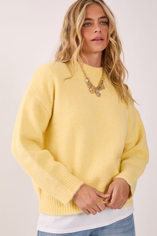 Cosy turtleneck design for ultimate comfort
        Oversized fit with voluminous balloon sleeves
        Ribbed cuffs and hem for a snug finish
        Soft knitted texture for a luxurious feel
        Versatile piece suitable for various casual occasions
    
    Embrace the chilly season with this NastyGal turtleneck sweater, a must-have addition to your autumn-winter wardrobe. The oversized silhouette paired with dramatic balloon sleeves creates a striking visual impact, perfect for those who love to make a statement with their casual wear. Style this jumper with a mini skirt and knee-high boots for a trendy contrast, as seen on our model. For a more laid-back look, pair it with your favourite jeans and trainers. The versatility of this piece makes it ideal for various casual settings, from coffee dates to family gatherings. Layer it over a collared shirt for a preppy twist, or wear it on its own for a sleek, minimalist approach. This turtleneck sweater is your go-to for effortless style and warmth throughout the cooler months.