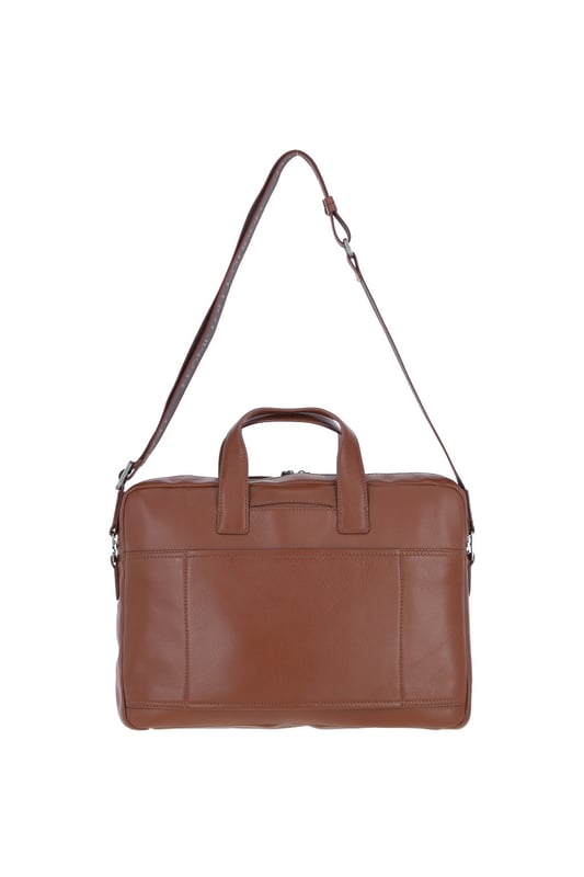 The Brampton Leather Laptop Bag combines style and functionality, crafted from 100% genuine leather for modern professionals. It features a padded laptop compartment, two external zip pockets, an external slip-in pocket, seven internal slip-in pockets, and an internal zip pocket for valuables. Equipped with a sturdy top handle and adjustable shoulder strap, this sleek and durable bag is perfect for commuting and business travel, gaining character with use. Dimensions: (L) 39.5 cm x (H) 30 cm x (W) 8.5 cm, with a strap length of 63.5 cm (longest) and 36 cm (shortest).