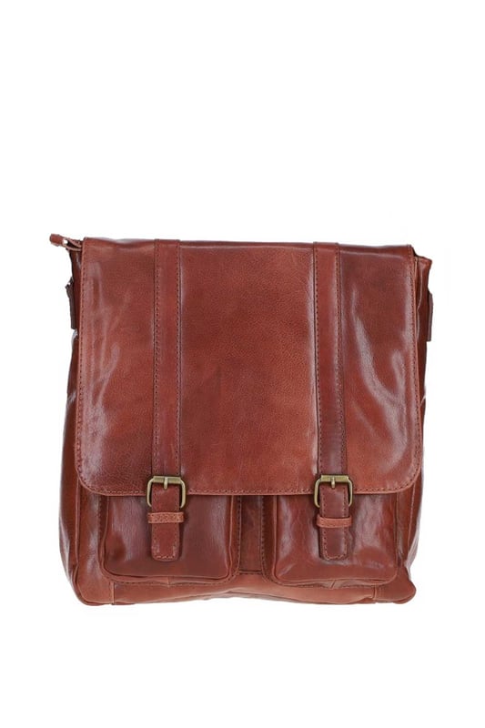 This premium leather messenger bag features brass hardware, a spacious main compartment, two front buckle pockets, and a back zip pocket for easy access. Inside, it offers two pockets and a compartment for organisation, along with an adjustable shoulder strap and fully lined branded interior. Dimensions: (L) 32 cm x (W) 11 cm x (H) 33 cm.