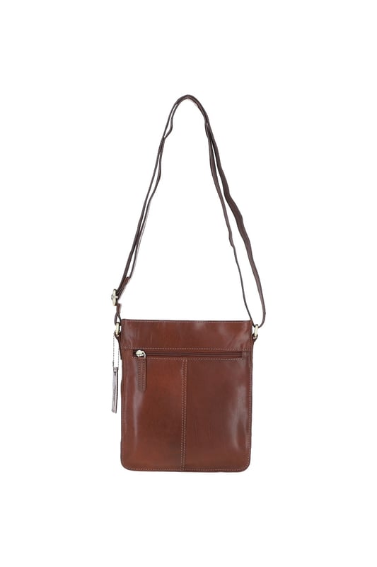 Crafted for style and convenience, this leather flap over side bag is the perfect hands-free companion for daily outings. With a spacious main compartment secured by a magnetic flap closure, it also features 2 outer pockets for quick-access items and 2 internal pockets to keep essentials organized. The gold-coloured hardware adds a refined touch, while the adjustable strap with a 35–72 cm drop length offers versatile wear as a crossbody or shoulder bag. Dimensions: 20 cm (L) x 7.5 cm (W) x 24 cm (H).