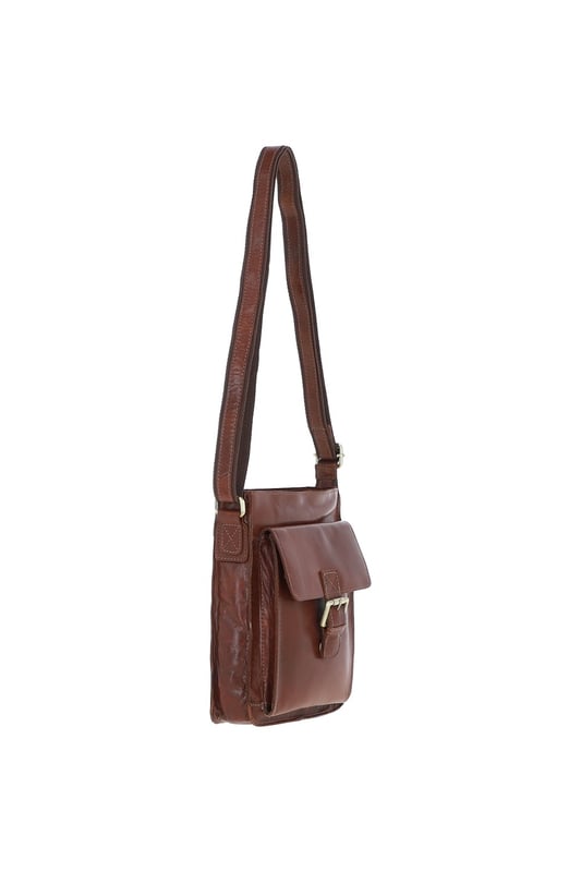 Crafted for style and convenience, this leather flap over side bag is the perfect hands-free companion for daily outings. With a spacious main compartment secured by a magnetic flap closure, it also features 2 outer pockets for quick-access items and 2 internal pockets to keep essentials organized. The gold-coloured hardware adds a refined touch, while the adjustable strap with a 35–72 cm drop length offers versatile wear as a crossbody or shoulder bag. Dimensions: 20 cm (L) x 7.5 cm (W) x 24 cm (H).