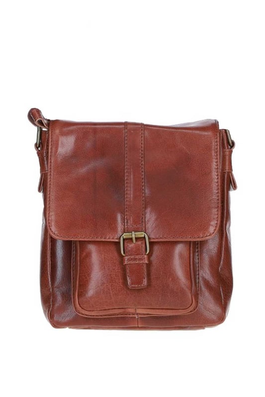 This stylish leather messenger bag combines functionality and elegance, ideal for everyday use. Made from premium leather with brass hardware, it offers a spacious main compartment, two internal pockets, one outer compartment, and a convenient back zip pocket for easy access. The adjustable shoulder strap ensures a comfortable fit, and the fully lined interior adds durability and a touch of luxury. Dimensions: (L) 23 cm x (W) 10 cm x (H) 25 cm with a drop-down strap length of 34 cm.