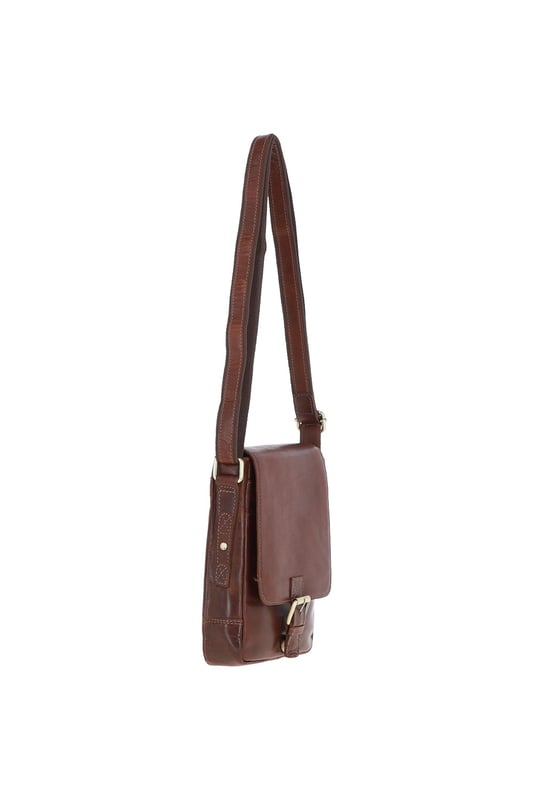 This compact leather flap over bag blends timeless craftsmanship with everyday practicality, making it ideal for city outings or casual wear. It features a spacious main compartment secured with a flap and magnetic closure, along with 2 outer zip pockets for added storage. The design is finished with elegant gold-coloured hardware and clean, structured lines. Its adjustable strap, with a drop length of 51–70 cm, offers flexibility for both crossbody and shoulder wear. Dimensions: (L) 19 cm x (W) 5.5 cm x (H) 25 cm.