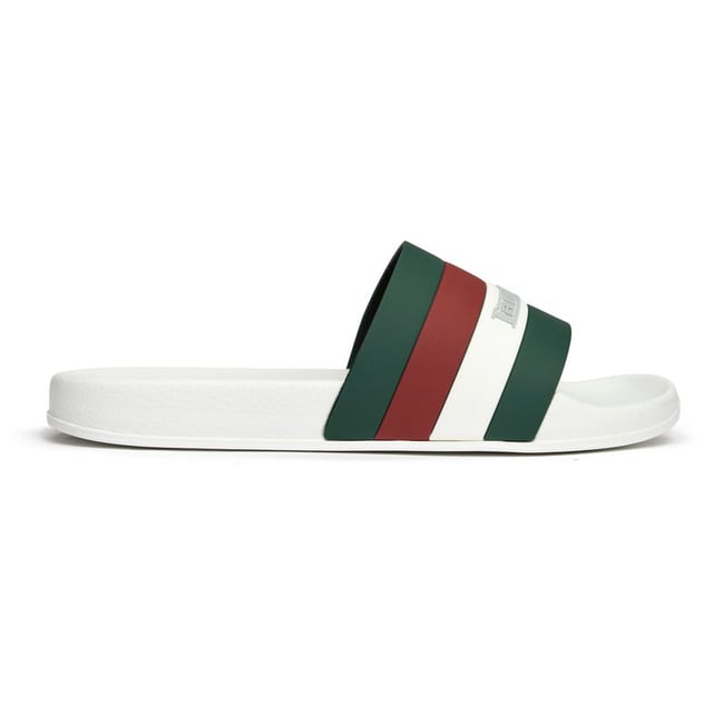 These crisp white slides from Lambretta deliver effortless summer style with their clean rubber construction and signature branding. The Prince features a comfort insole that makes them perfect for poolside lounging or casual errands around town. Simple yet refined, they're the kind of versatile footwear that pairs as well with swim shorts as it does with weekend casual wear.