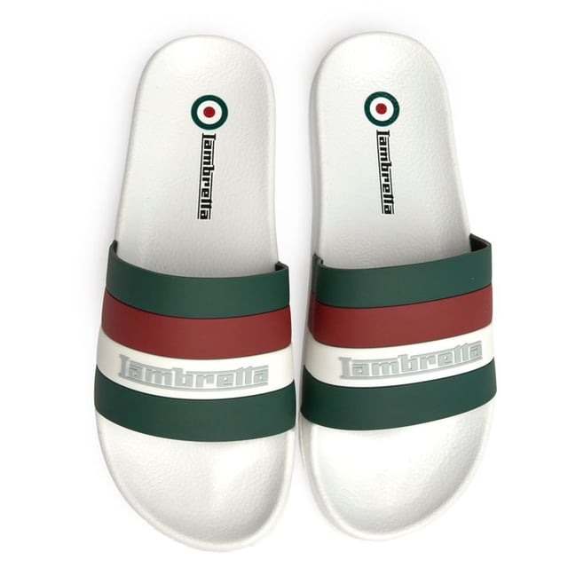 These crisp white slides from Lambretta deliver effortless summer style with their clean rubber construction and signature branding. The Prince features a comfort insole that makes them perfect for poolside lounging or casual errands around town. Simple yet refined, they're the kind of versatile footwear that pairs as well with swim shorts as it does with weekend casual wear.