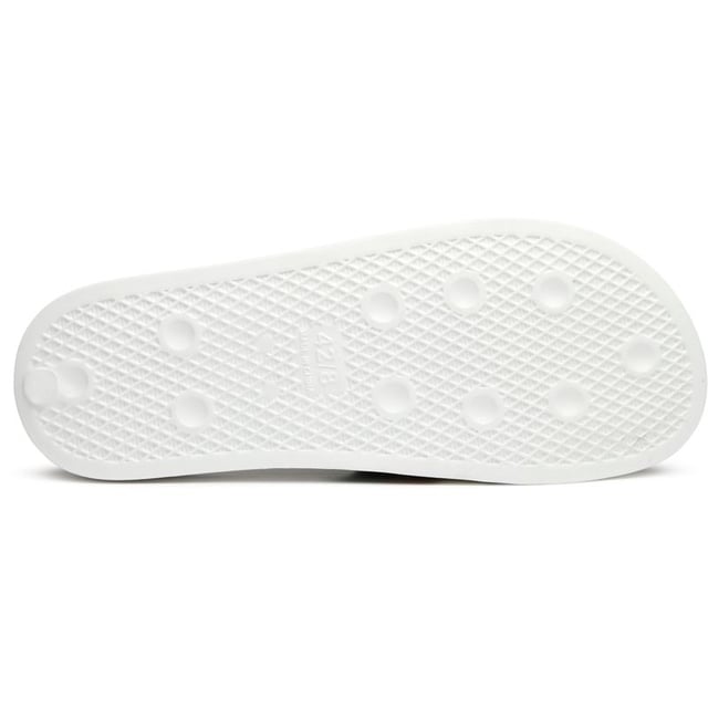 These crisp white slides from Lambretta deliver effortless summer style with their clean rubber construction and signature branding. The Prince features a comfort insole that makes them perfect for poolside lounging or casual errands around town. Simple yet refined, they're the kind of versatile footwear that pairs as well with swim shorts as it does with weekend casual wear.