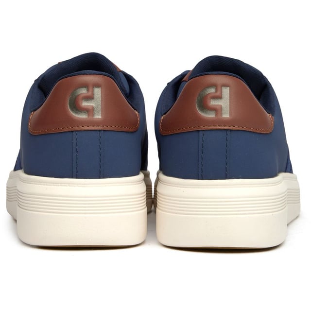 Zapatillas Cole Haan Grand Crosscourt Premier azules para hombre, fabricadas en piel y suela de goma. Incluyen: plantilla ligera y acolchada, logo de Cole Haan y suela Grand 360.