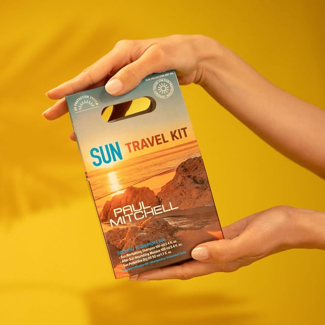 Discover the ultimate travel companion with the Paul Mitchell Sun Travel Kit, beautifully packaged in an eco-friendly box. This kit includes travel-sized versions of essential Paul Mitchell Sun products: Revitalizing Shampoo (100 ml), After Sun Nourishing Masque (100 ml), and Sun Protective Dry Oil (50 ml). Each product is formulated with a UV Protection System to protect your hair from sun damage, leaving it soft and shiny. Ideal for holidays or as a thoughtful gift, this kit is a must-have for sun-kissed adventures.