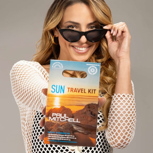 Discover the ultimate travel companion with the Paul Mitchell Sun Travel Kit, beautifully packaged in an eco-friendly box. This kit includes travel-sized versions of essential Paul Mitchell Sun products: Revitalizing Shampoo (100 ml), After Sun Nourishing Masque (100 ml), and Sun Protective Dry Oil (50 ml). Each product is formulated with a UV Protection System to protect your hair from sun damage, leaving it soft and shiny. Ideal for holidays or as a thoughtful gift, this kit is a must-have for sun-kissed adventures.