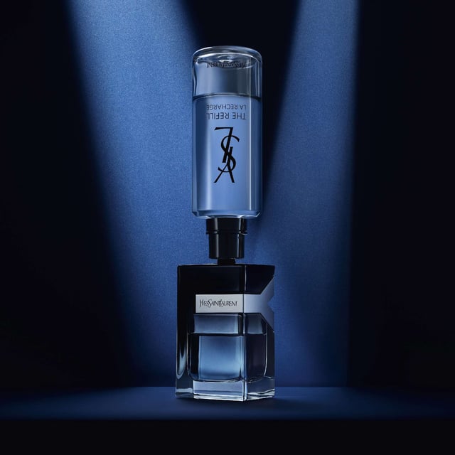 Discover the bold essence of the Yves Saint Laurent Y Eau de Parfum Refill for Men, a fragrance designed for the modern man who embraces his passions. This captivating scent opens with invigorating top notes of bergamot, ginger, and green apple, delivering a refreshing burst of energy. The heart features sophisticated floral notes of geranium and lavender, while the base reveals a warm blend of tonka bean, frankincense, and smoky vetiver. Encased in a striking bottle that symbolizes duality and sophistication, this 150ml refill is perfect for the confident man ready to take on any challenge.
