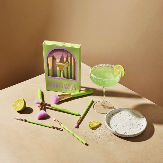 Elevate your makeup routine with the Spectrum Margarita 6 Piece Brush Set, featuring a curated selection of face, eye, and brow brushes inspired by vibrant cocktail shades. This essential set includes the B13 brush for flawless application, the A05 cheek brush for sculpting, and the B08 brush to brighten under eyes or add highlights. Blend eyeshadow seamlessly with the B06 brush, and define your crease and lash line with the A12 fluffy pencil. Complete your look with the A24 brow styler for perfectly shaped brows. Ideal for women who love bold beauty.