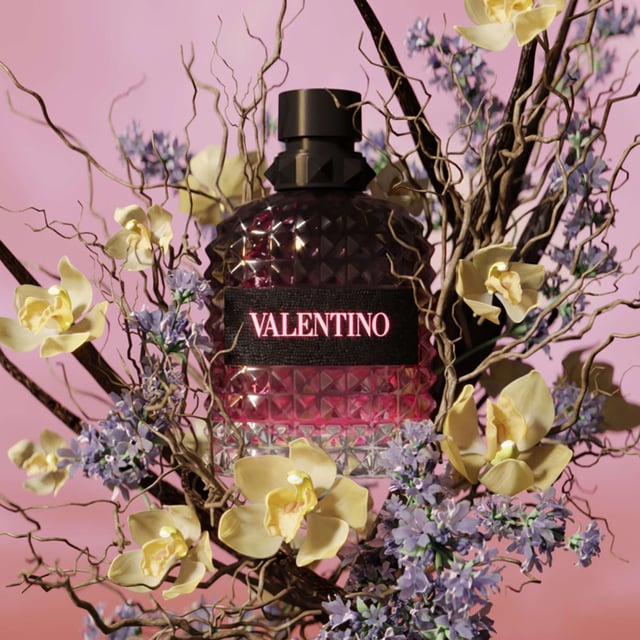 Experience the allure of Valentino Born In Roma Uomo Intense Eau de Parfum, a captivating ambery fougère fragrance for the modern man. This scent blends rich lavandin and smooth vanilla, creating a hypnotic aura that embodies Rome's vibrant spirit. Perfect for unforgettable nights, it features top notes of mandarin, ginger, and bergamot, a heart of nutmeg and lavandin, and a base of smoky vetiver. Housed in a studded bottle, this fragrance represents Valentino's couture elegance and is ideal for both day and night, making it a must-have in any fragrance collection.