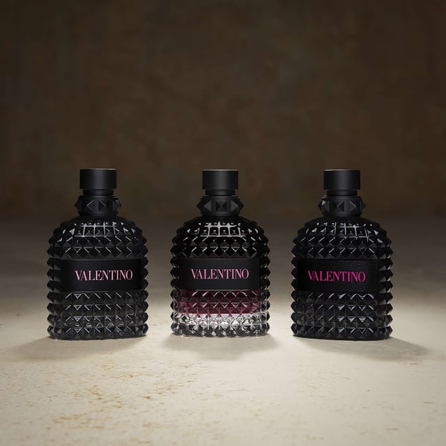 Experience the allure of Valentino Born In Roma Uomo Intense Eau de Parfum, a captivating ambery fougère fragrance for the modern man. This scent blends rich lavandin and smooth vanilla, creating a hypnotic aura that embodies Rome's vibrant spirit. Perfect for unforgettable nights, it features top notes of mandarin, ginger, and bergamot, a heart of nutmeg and lavandin, and a base of smoky vetiver. Housed in a studded bottle, this fragrance represents Valentino's couture elegance and is ideal for both day and night, making it a must-have in any fragrance collection.