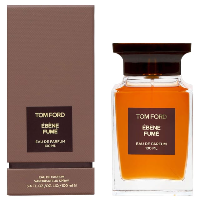 Discover the allure of Tom Ford's Ébène Fumé Eau de Parfum Spray, a captivating unisex fragrance. This luxurious scent features a warm and smoky profile, with an intoxicating blend of palo santo, cistus absolute, and black pepper for a refreshing start. As it unfolds, rich notes of dark ebony wood and sumptuous leather create a deep, sophisticated aroma. Perfect for any occasion, this 100ml bottle of elegance is a must-have for fragrance enthusiasts seeking a unique and indulgent experience.
