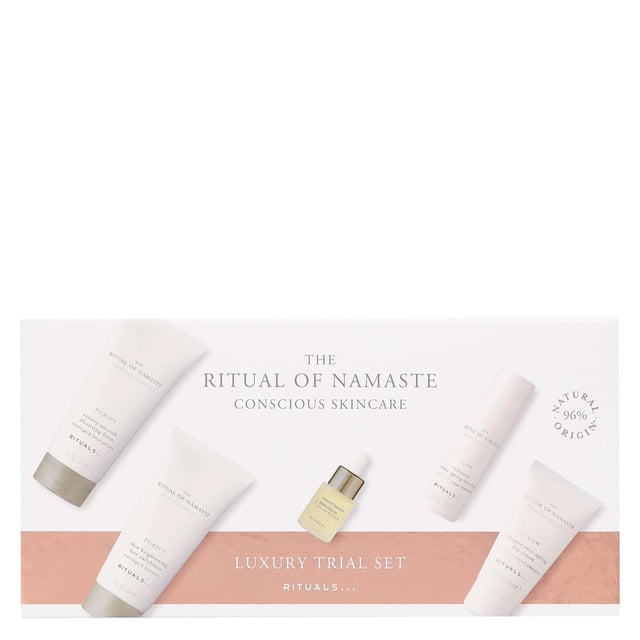Discover the Rituals The Ritual of Namaste Luxury Skincare Trial Set, featuring over 93% natural ingredients and plant-based alternatives to retinol. This luxurious set includes: 30ml Skin Brightening Face Exfoliator, 10ml Glow Serum, 4ml Natural Booster Bakuchiol, 10ml Glow Day Cream, and 30ml Velvety Smooth Cleansing Foam. Each product is designed to enhance your skin's radiance and vitality. Perfect for your daily skincare routine, these products cleanse, exfoliate, and nourish your skin, leaving it soft, smooth, and rejuvenated. Ideal for women seeking a natural skincare solution.