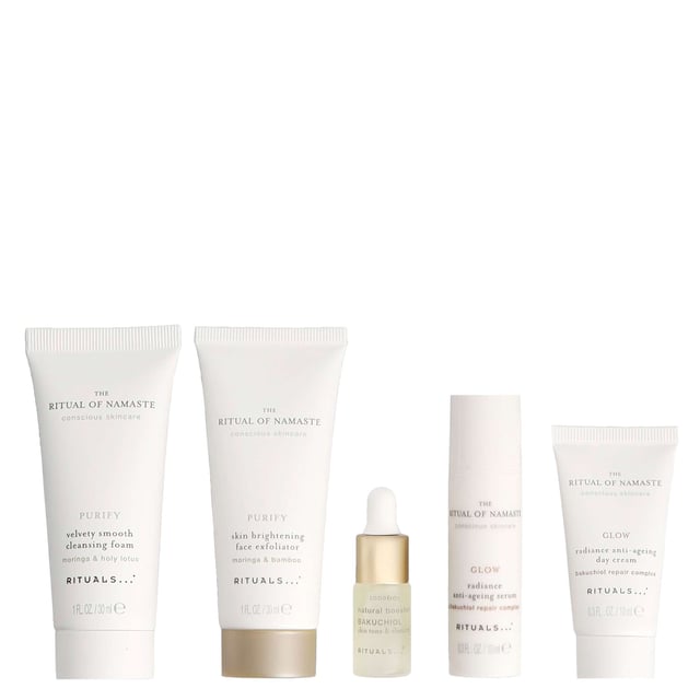 Discover the Rituals The Ritual of Namaste Luxury Skincare Trial Set, featuring over 93% natural ingredients and plant-based alternatives to retinol. This luxurious set includes: 30ml Skin Brightening Face Exfoliator, 10ml Glow Serum, 4ml Natural Booster Bakuchiol, 10ml Glow Day Cream, and 30ml Velvety Smooth Cleansing Foam. Each product is designed to enhance your skin's radiance and vitality. Perfect for your daily skincare routine, these products cleanse, exfoliate, and nourish your skin, leaving it soft, smooth, and rejuvenated. Ideal for women seeking a natural skincare solution.