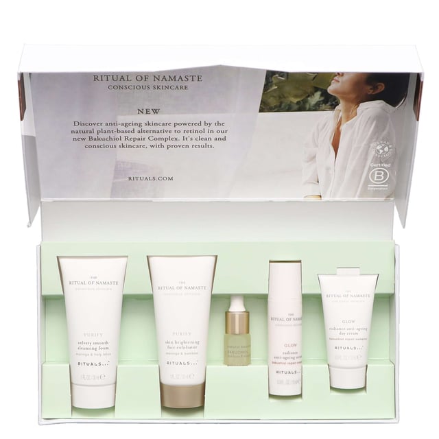 Discover the Rituals The Ritual of Namaste Luxury Skincare Trial Set, featuring over 93% natural ingredients and plant-based alternatives to retinol. This luxurious set includes: 30ml Skin Brightening Face Exfoliator, 10ml Glow Serum, 4ml Natural Booster Bakuchiol, 10ml Glow Day Cream, and 30ml Velvety Smooth Cleansing Foam. Each product is designed to enhance your skin's radiance and vitality. Perfect for your daily skincare routine, these products cleanse, exfoliate, and nourish your skin, leaving it soft, smooth, and rejuvenated. Ideal for women seeking a natural skincare solution.