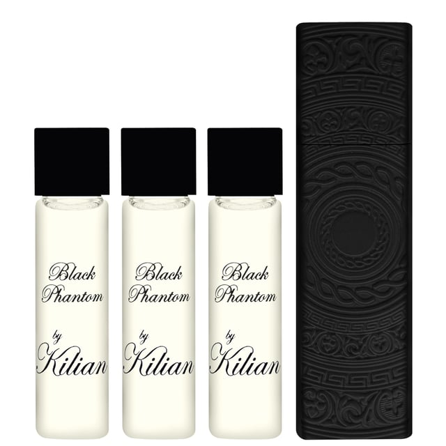 Discover the Kilian Black Phantom "Memento Mori" Eau de Parfum Travel Set, a captivating collection featuring four 7.5ml bottles of this enchanting fragrance. This dark and mysterious scent unveils ethereal amber notes, enriched with warm spices and a delightful sweetness. Experience the luxurious blend of rich vanilla, dark chocolate, rum, caramel, and coffee, perfectly balanced with a touch of sugar and enhanced by sandalwood, heliotrope, and almond for a savory richness. Ideal for on-the-go elegance, this set includes a stylish Kilian Travel Atomiser.