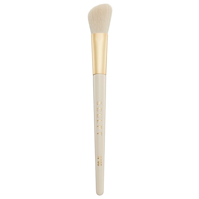 Achieve a flawless sculpted look with the Spectrum Sculpt Brush, designed for precision in contouring and highlighting. Its angled head hugs the curves of your face, allowing easy application and blending. Made with advanced synthetic fibres that mimic natural hair, this brush is soft and features an anti-bacterial treatment for hygiene. Handcrafted with a stylish copper ferrule and FSC-certified wooden handle, this brush combines beauty and functionality, making it an essential addition to your makeup kit for stunning looks.
