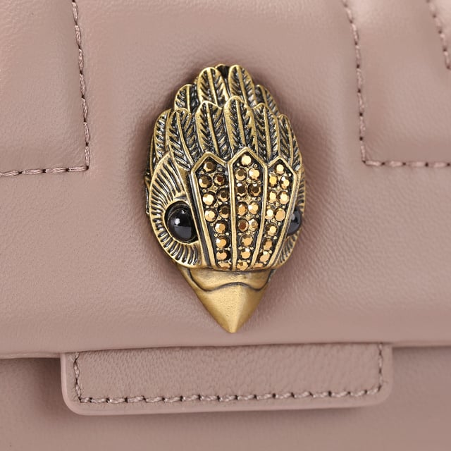 The Mini Kensington is crafted from a beige leather with stitching detail creating the Union Jack. The gold brass eagle head features crystals and crystal eyes on the front flap. 14cm (H), 20cm (L), 6cm (D). Strap drop cross body: 120cm. Strap drop shoulder: 70cm.