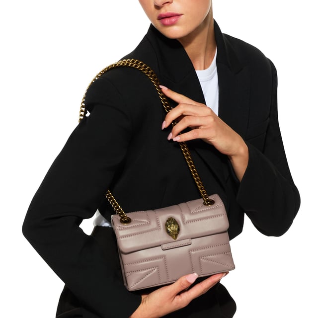 The Mini Kensington is crafted from a beige leather with stitching detail creating the Union Jack. The gold brass eagle head features crystals and crystal eyes on the front flap. 14cm (H), 20cm (L), 6cm (D). Strap drop cross body: 120cm. Strap drop shoulder: 70cm.